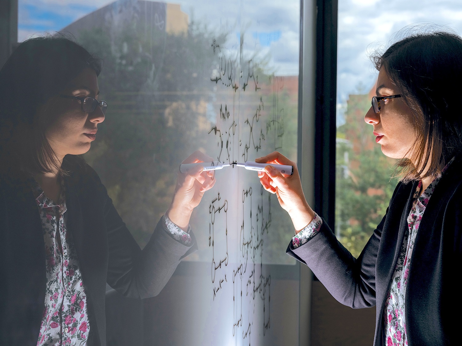 Shruti Puri’s research is at the intersection of quantum optics — that is, how light interacts with matter — and quantum information theory.