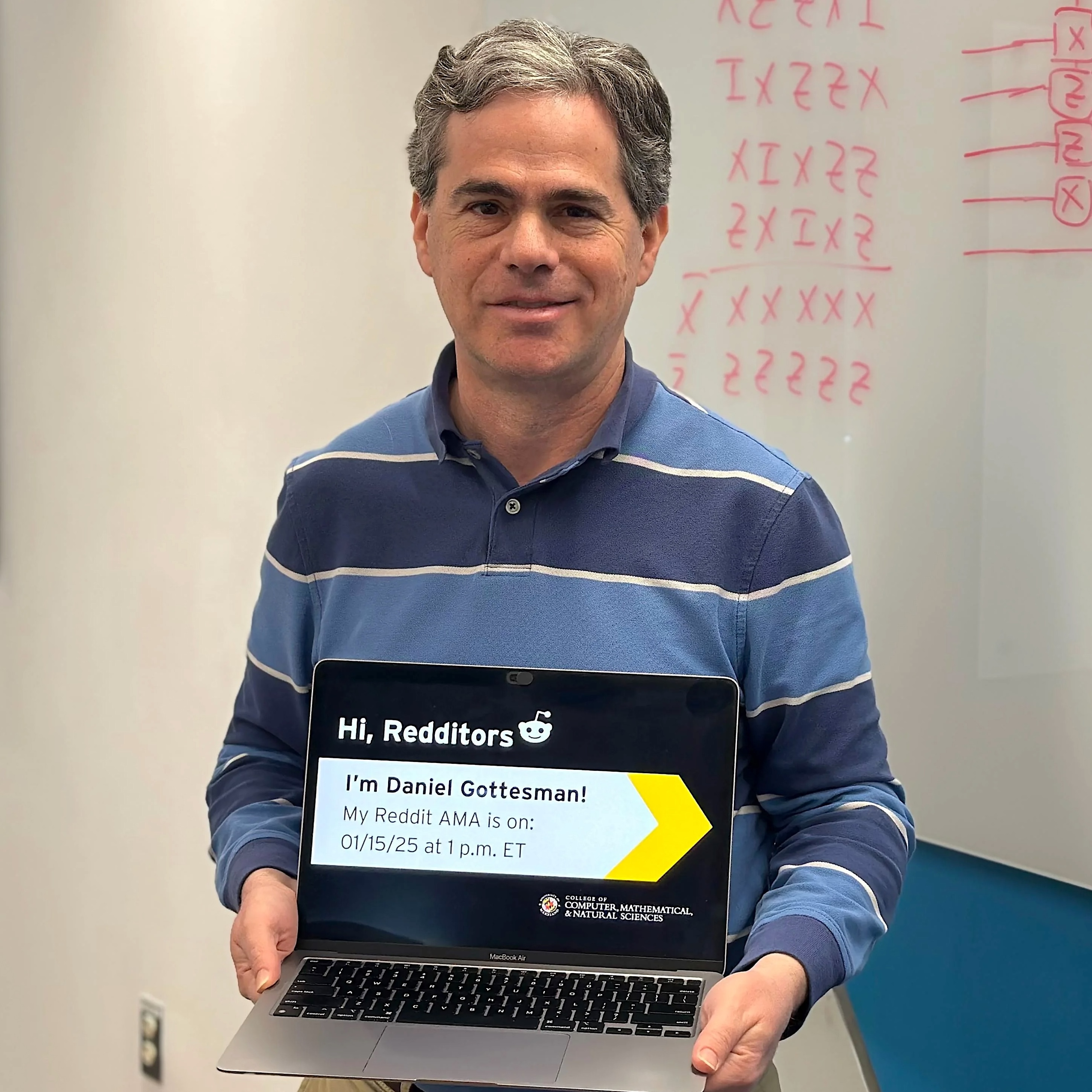 Daniel Gottesman holding a Reddit AMA sign.