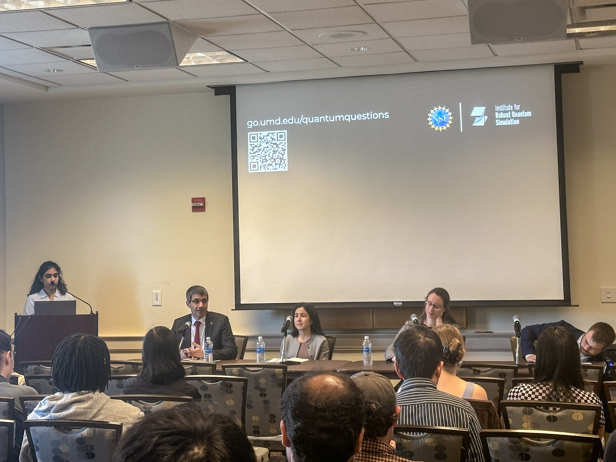 A panel of experts discusses quantum policy initiatives during a moderated session at 2025 Quantum & Public Policy Panel Discussion